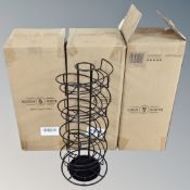 Three Maison and White metal stands.