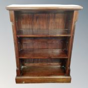 A set of eastern hardwood open bookshelves.
