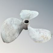 A three blade boat propeller.