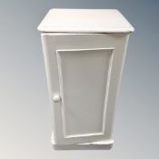 A painted pot cupboard.