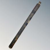 An antique brass telescope.