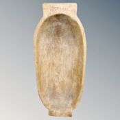 A vintage wooden dough trough dated 1932,