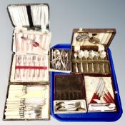 A tray of silver plated cutlery, teaspoons, butter knives, fish cutlery.