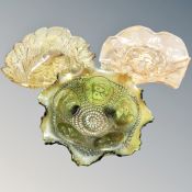 Three pieces of carnival glass.