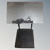 A metal music stand together with a ProSound microphone.