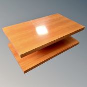 A contemporary two tier Art Deco style coffee table.