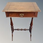 A 19th century worktable.