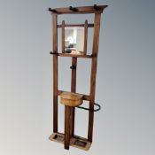A 19th century oak mirrored hall stand