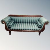 A Regency style scroll arm salon settee in green striped fabric