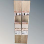 Five packs of Leona warm oak effect laminate flooring.
