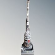 A Dyson DC14 upright vacuum.