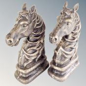 A pair of cast iron horse head bookends.