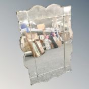 A 1930's frameless bevelled mirror