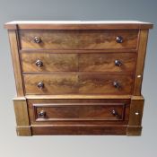 A Victorian mahogany inverted break fronted four drawer chest on chest