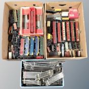 Three boxes containing a large quantity of Hornby rolling stock including engines, tenders, wagons,