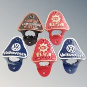 Five cast iron bar bottle openers, Harley Davidson, BSA and Volkswagen.