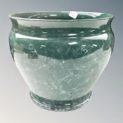 A pottery plant pot (internal diameter 29cm)