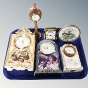 A tray containing a collection of mid-century and later desk and mantel clocks including Country