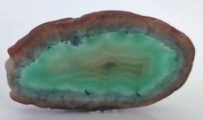 An agate green slice measuring approximately 1.75
