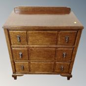 A 1930's oak three drawer chest