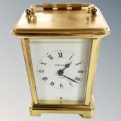 A French brass cased mantel clock, signed Bayard.
