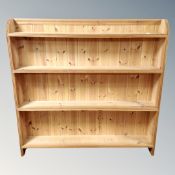 A set of pine open bookshelves,
