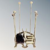 A cast iron horse head boot stand.