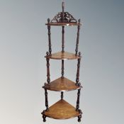 A Victorian inlaid four tier corner what-not