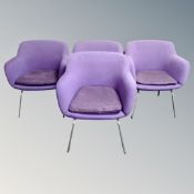 A set of four Hille Robin Day designed tub armchairs in purple fabric on metal legs