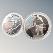 Two Winston Churchill £5 coins.