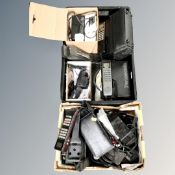 Two boxes of British Telecom and Panasonic vintage satellite phones and accessories