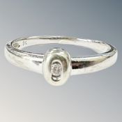 A 9ct white gold diamond solitaire ring. size R CONDITION REPORT: 2.