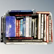 A crate of hard backed volume relating to war and aviation