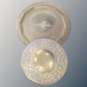 A brass plaque with eastern dagger & crescent decor,