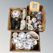 Three boxes of Oriental style ceramics, carved hardwood figures, Japanese style motion lamp,