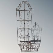 Two wire metal corner folding garden shelves together with two plant troughs and hanging basket