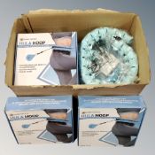 A box of thirteen Desire delux fitness hula hoops