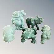 A green polished stone figure - Buddha together with four further polished stone animal figures