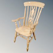 A pine farmhouse armchair