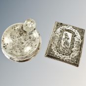 A silver ashtray with weighted base and a continental silver cigarette case stamped '800'.