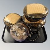 A set of three Japanese wicker and lacquered graduated baskets, further nut shell basket.