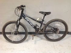 A child's Carrera Vengeance front suspension mountain bike