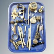 A tray of metal wares, letter opener in the form of a sword, silver-handled knives,