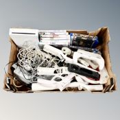 A Nintendo Wii with leads, controllers and accessories,
