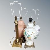A brass Corinthian column table lamp together with three further ceramic table lamps