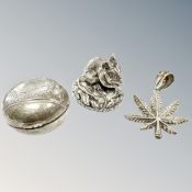 A loaded-silver figure of a mouse, height 3.