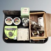 A tray of carved wooden jewellery box, quantity of fishing equipment, reels, lures, line,
