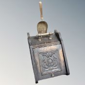 A 19th century oak brass handled coal receiver with shovel