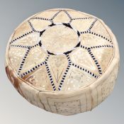 A Moroccan style leather footstool