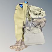 A box of fishing waders, fishing jacket, landing net,